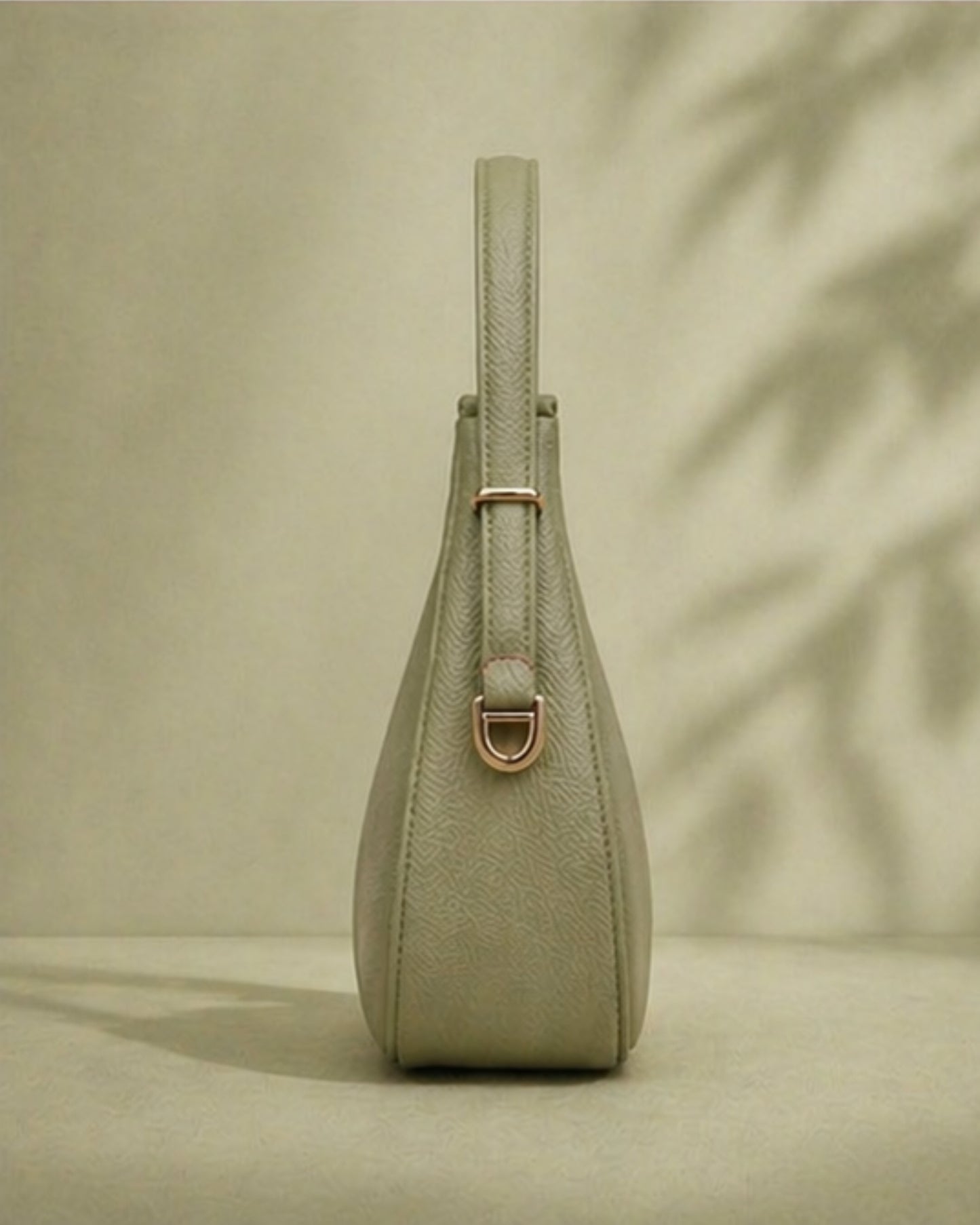 Swag Wali Saheli Textured Curved Shoulder Bag (Sage Green)